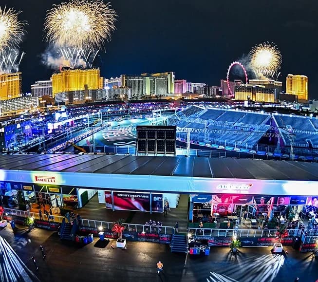 Formula 1 — Night view of a race venue with fireworks above the city